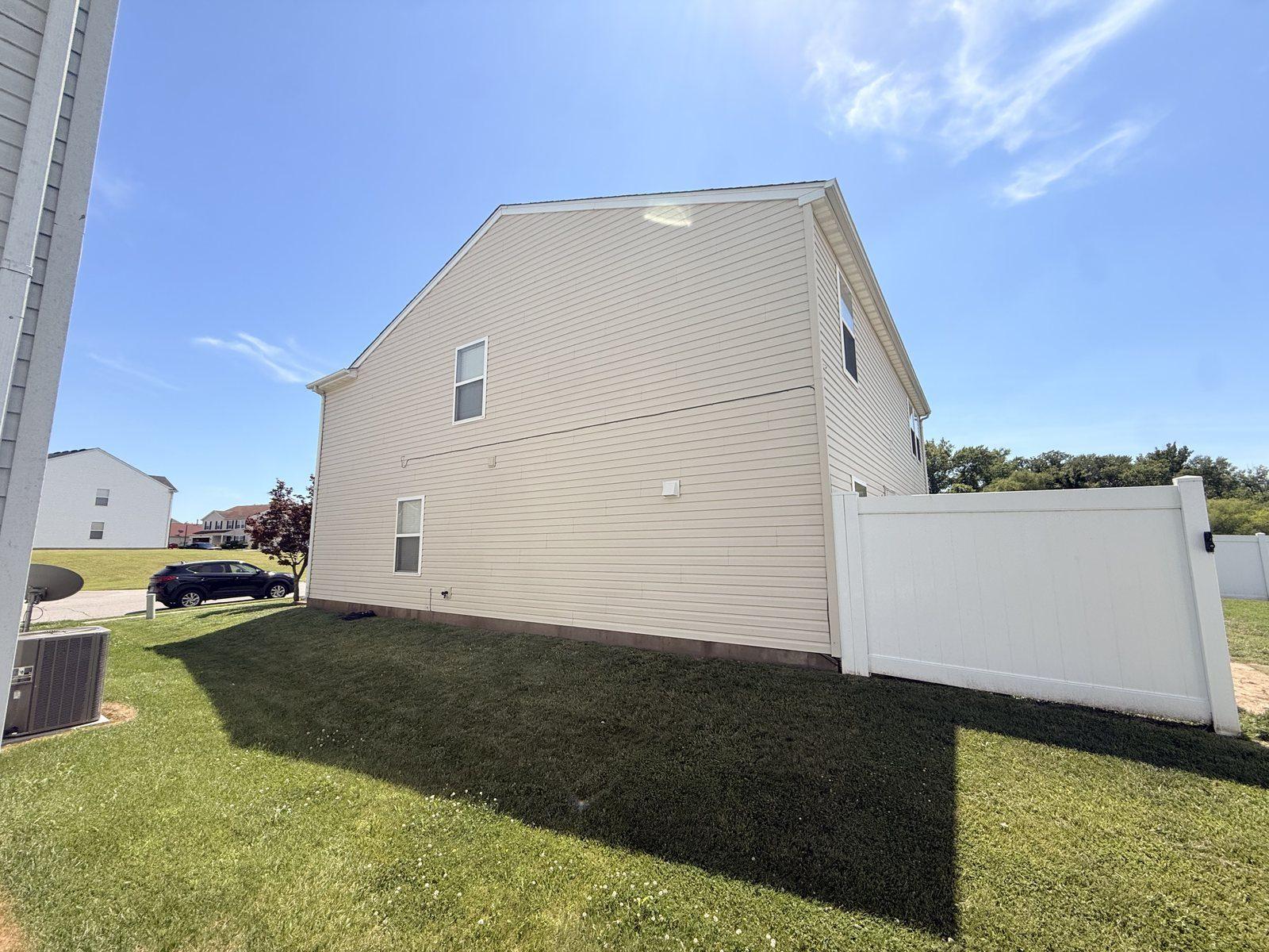 Soft wash — clean side-wall siding (verified job)
