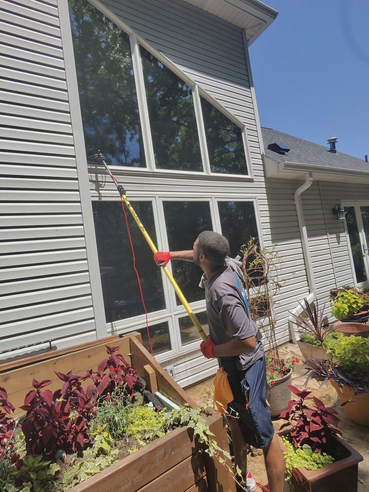 Window cleaning — Tucker water-fed pole in action
